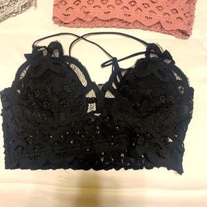 Black bralette size medium with removable pads stretch and adjustable straps